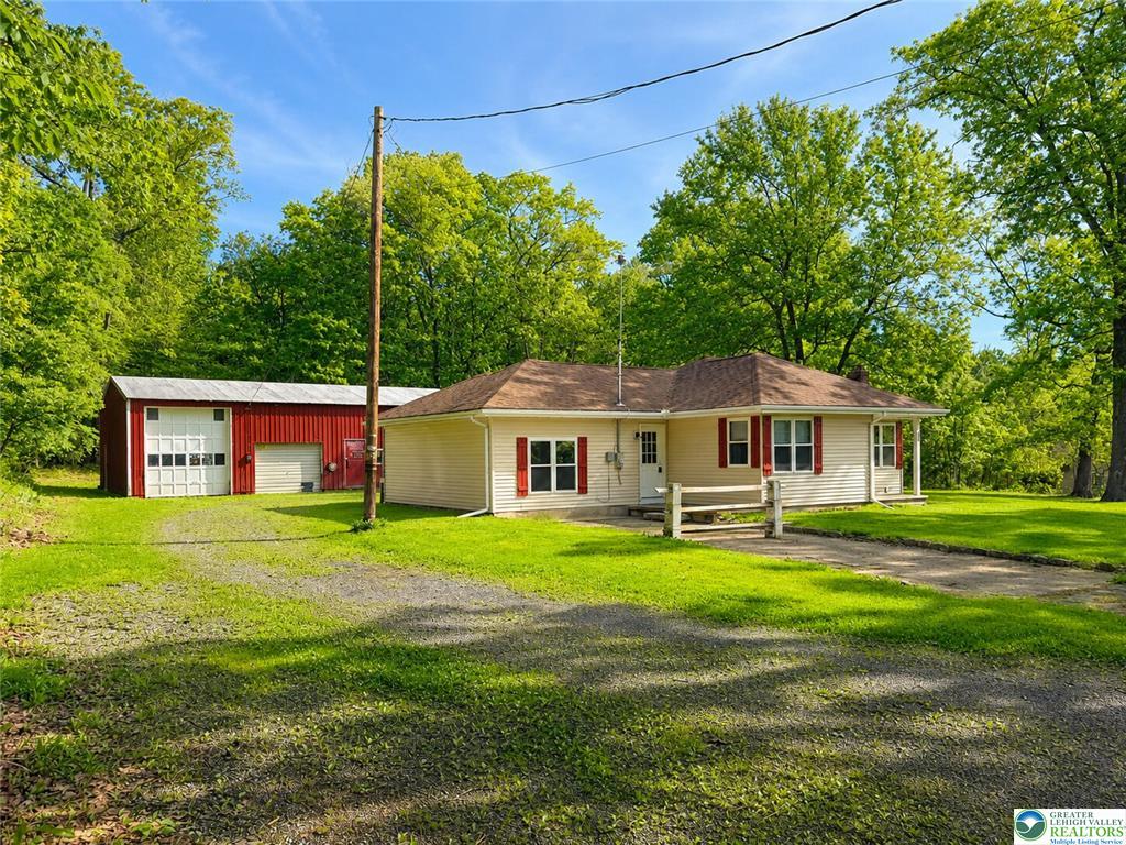 Ranch home with detached garage at 4995 Mountain Road in Slatington